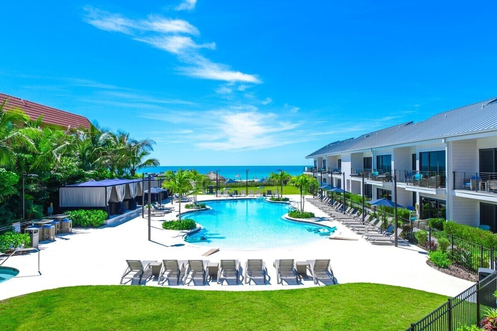Anna Maria Beach Resort, one of the top Anna Maria Island hotels, on its private beach in Holmes Beach