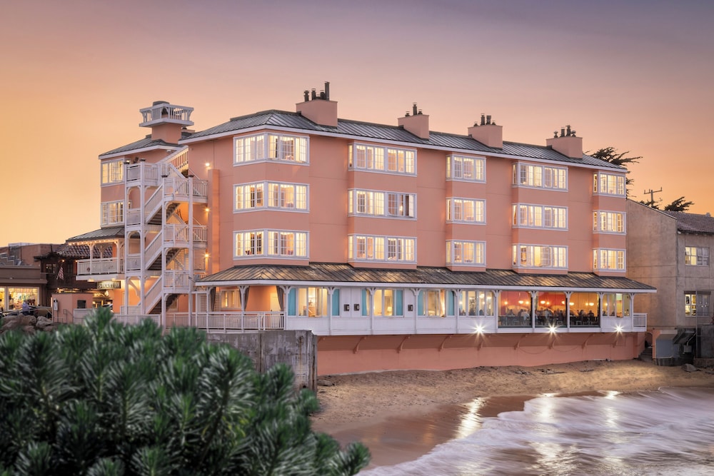 Spindrift Inn oceanfront exterior on Cannery Row, one of the best Monterey hotels beside McAbee Beach