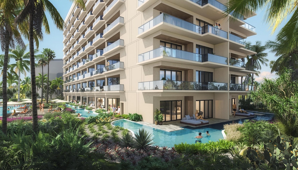 Hilton Aruba Caribbean Resort and Casino, one of the top aruba all inclusive resorts, on Palm Beach in Noord with pools and beachfront towers
