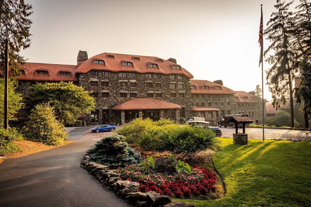 The Omni Grove Park Inn & Spa, one of the top Asheville hotels, with historic stone architecture on a Blue Ridge mountainside