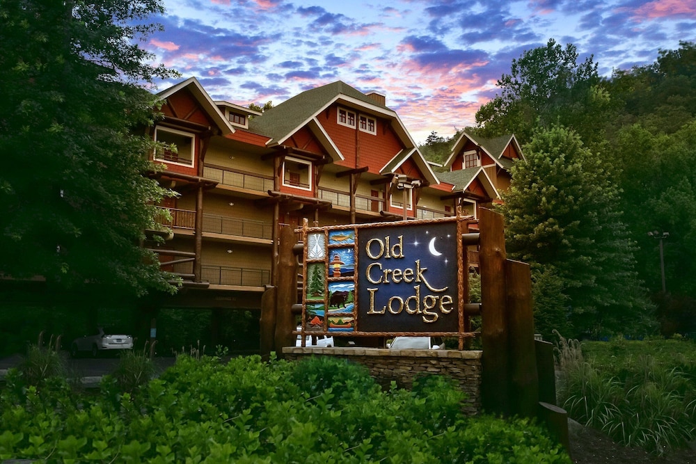 Old Creek Lodge, one of the best Gatlinburg hotels, with riverside balcony rooms just off the Parkway
