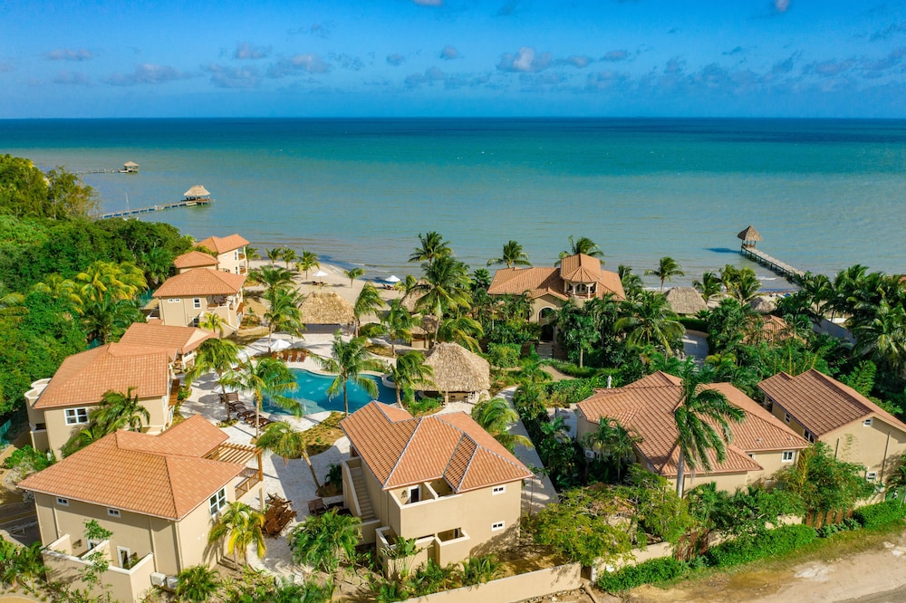 Sirenian Bay Resort villas and all-inclusive bungalows with private pools on the Placencia beach, one of the top Belize all inclusive resorts